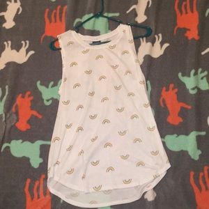This is a cute white tank top with little rainbows